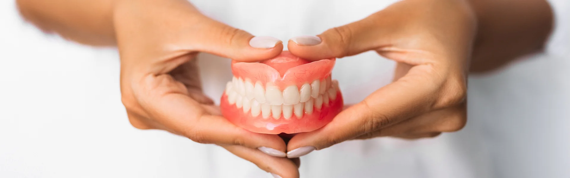 Dental Implants or Dentures: Making an Informed Decision